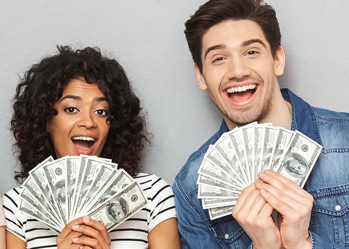 photo of happy people with money